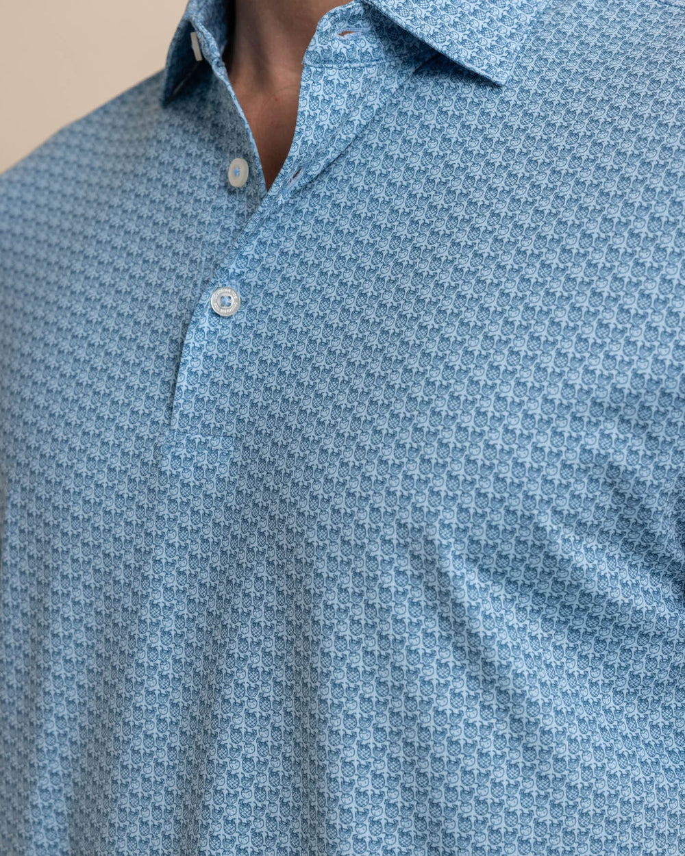 The detail view of the Southern Tide Driver Vacation Views Printed Polo by Southern Tide - Clearwater Blue