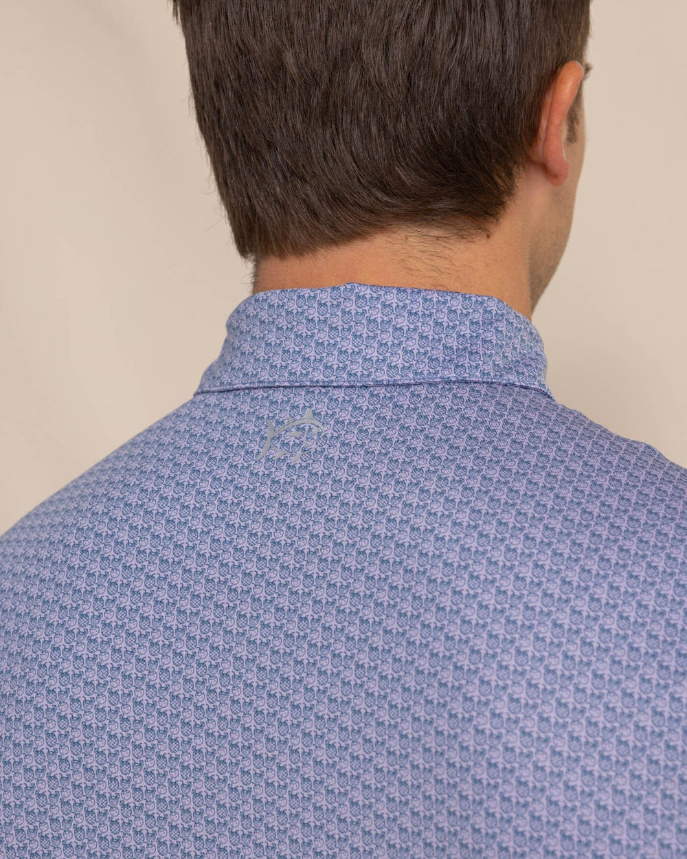 The detail view of the Southern Tide Driver Vacation Views Printed Polo by Southern Tide - Wisteria Purple
