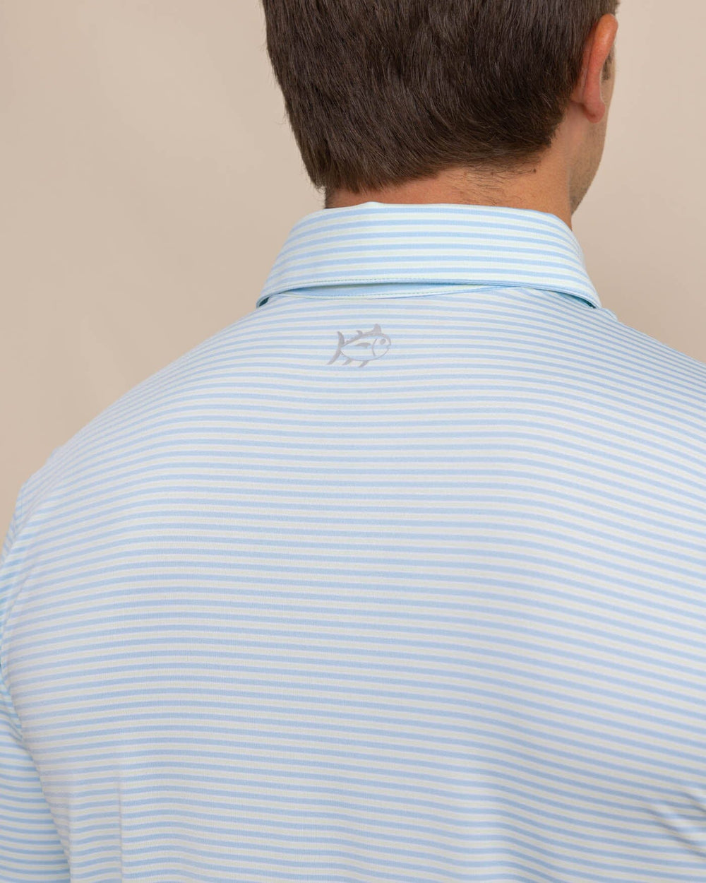 The detail view of the Southern Tide Driver Verdae Stripe Polo by Southern Tide - Seacrest Green