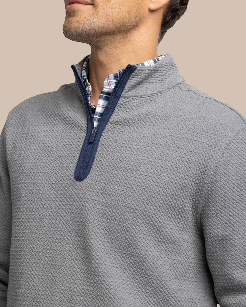The detail view of the Southern Tide Heather Outbound Quarter Zip by Southern Tide - Heather Shadow Grey