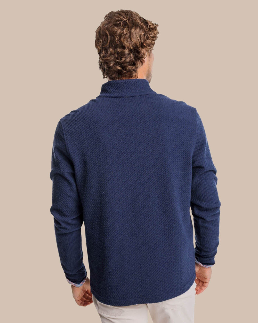 The back view of the Southern Tide Heather Outbound Quarter Zip by Southern Tide - Heather True Navy