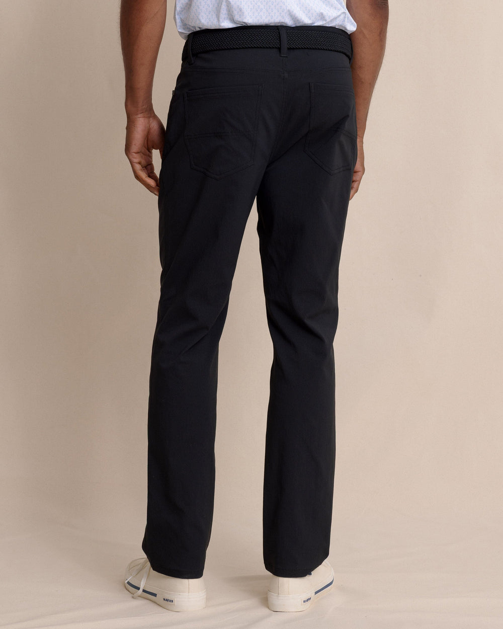 The back view of the Southern Tide Intercoastal Performance Pant in Caviar Black by Southern Tide - Caviar Black
