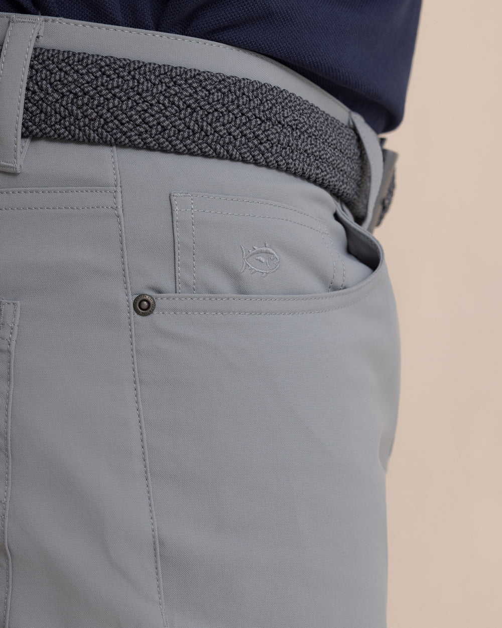 The detail view of the Southern Tide Intercoastal Performance Pant in Steel Grey by Southern Tide - Steel Grey