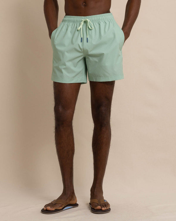 The front view of the Southern Tide It's Wavey Baby Swim Trunk by Southern Tide - Basil Green