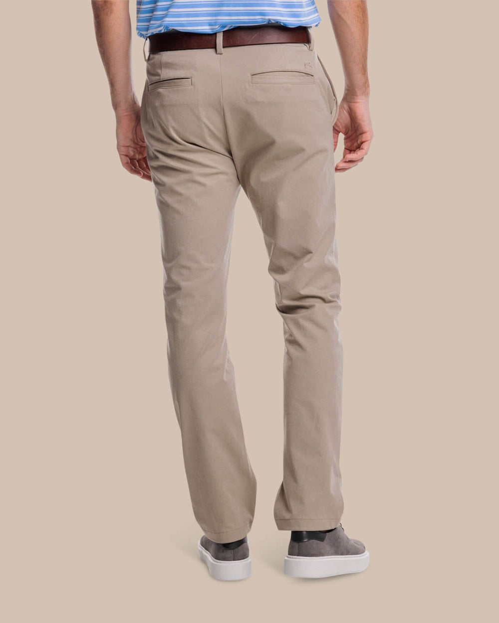 The back view of the Southern Tide Jack Performance Pant by Southern Tide - Sandstone Khaki
