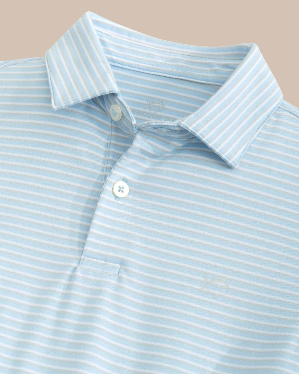 The detail view of the Southern Tide Kids Ryder Heather Halls Stripe Performance Polo by Southern Tide - Heather Clearwater Blue