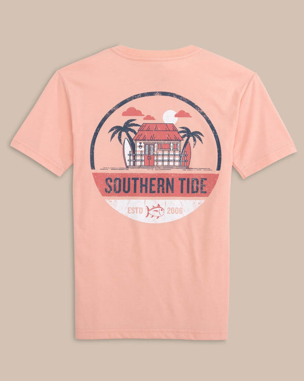 The back view of the Southern Tide Kids Shack Circle Short Sleeve T-shirt by Southern Tide - Apricot Blush Coral