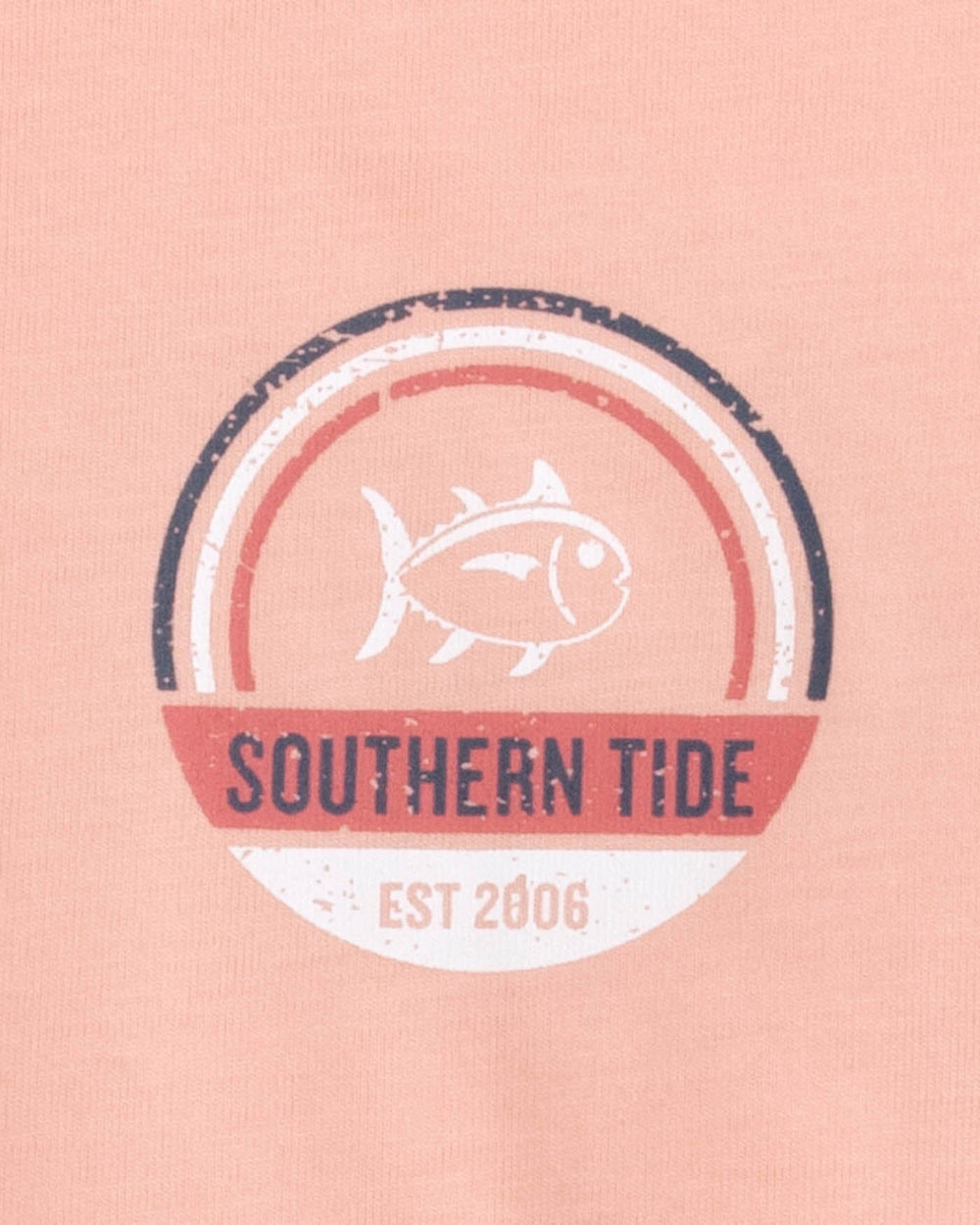 The detail view of the Southern Tide Kids Shack Circle Short Sleeve T-shirt by Southern Tide - Apricot Blush Coral