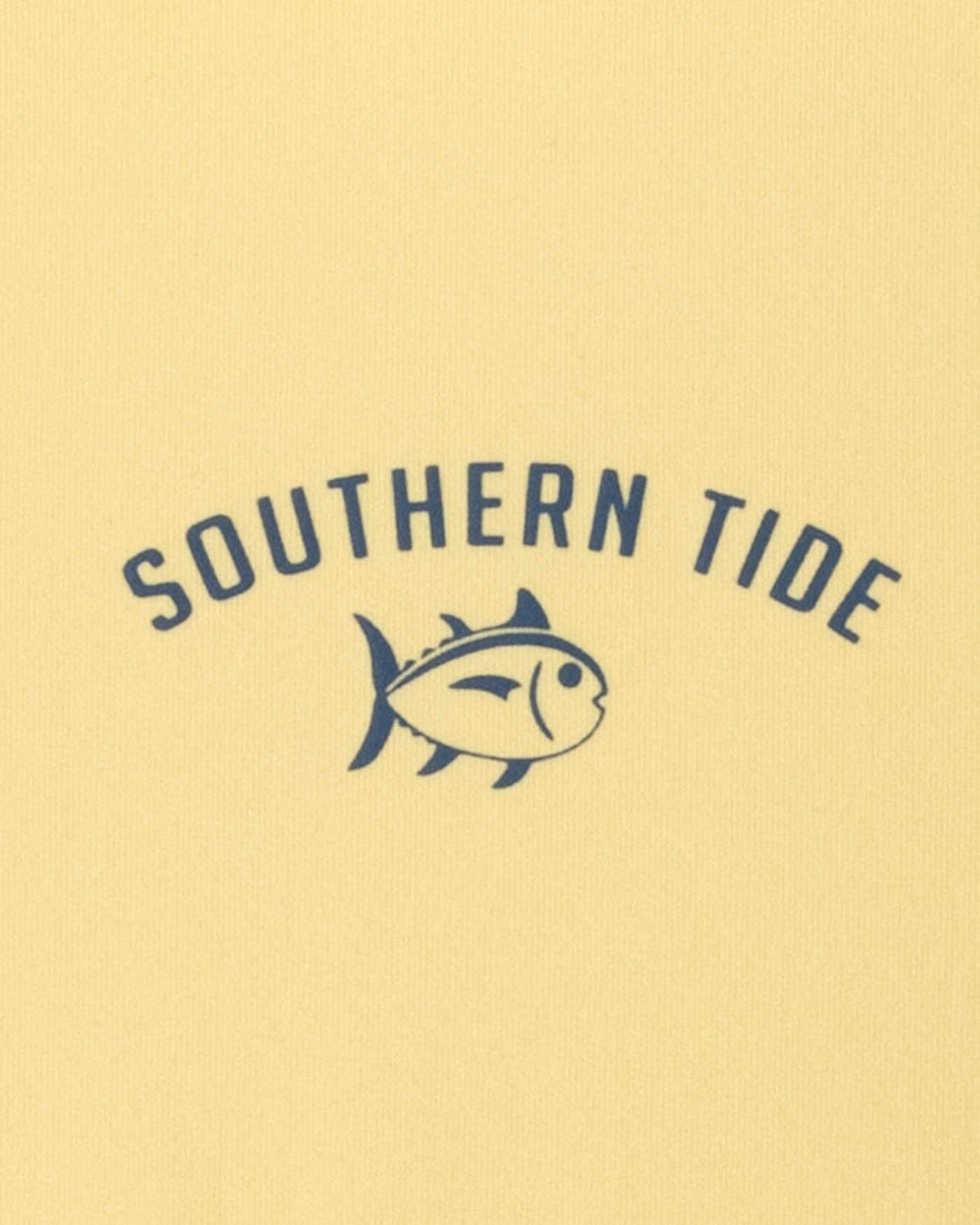 The detail view of the Southern Tide Kids Sharks and Skipjacks Performance Long Sleeve T-Shirt by Southern Tide - Golden Haze Yellow