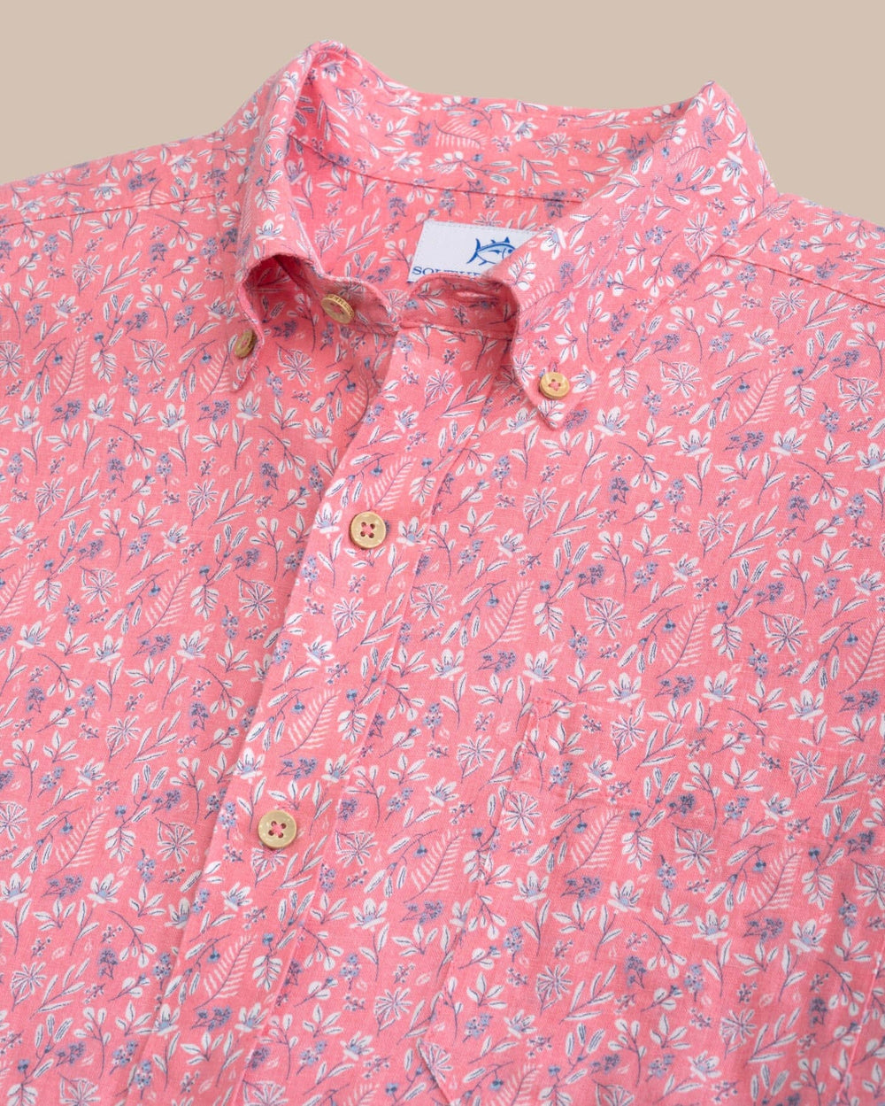 The detail view of the Southern Tide Linen Rayon Ditzy Floral Short Sleeve Sport Shirt by Southern Tide - Geranium Pink