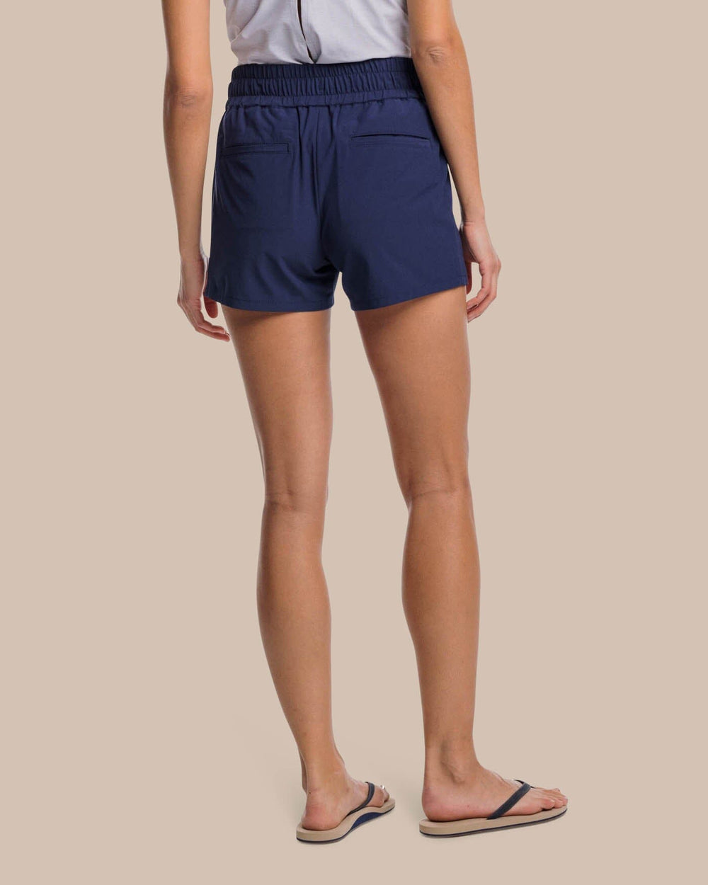 The back view of the Southern Tide Neeley brrr Performance Short by Southern Tide - Nautical Navy