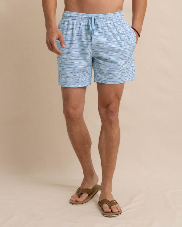 The front view of the Southern Tide Ocean Water Stripe Swim Trunk by Southern Tide - Subdued Blue
