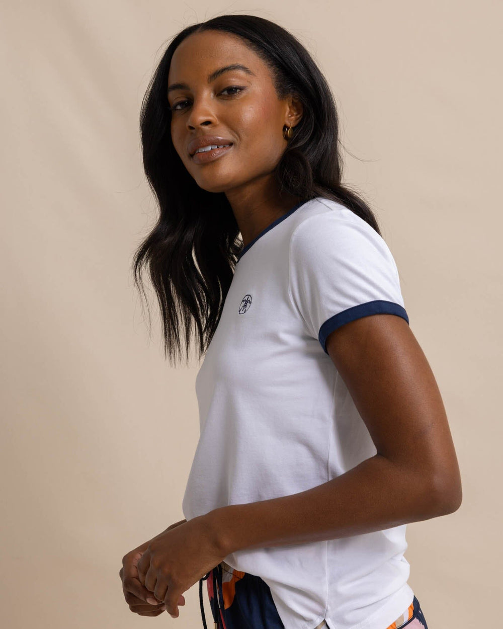 The front view of the Reece Baby Pique Top by Southern Tide - Classic White
