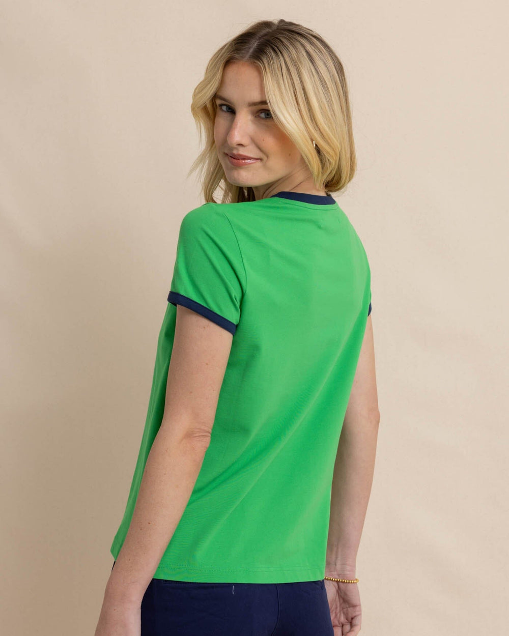 The back view of the Reece Baby Pique Top by Southern Tide - Lawn Green