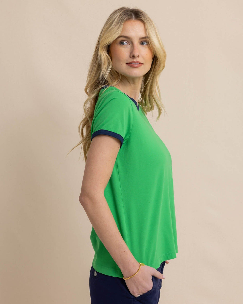 The front view of the Reece Baby Pique Top by Southern Tide - Lawn Green