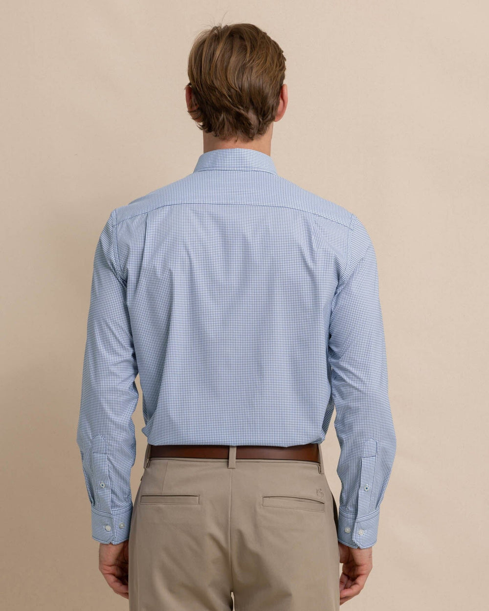 The back view of the Men's Rosemont Brrr® Intercoastal Performance Sport Shirt by Southern Tide - Seven Seas Blue