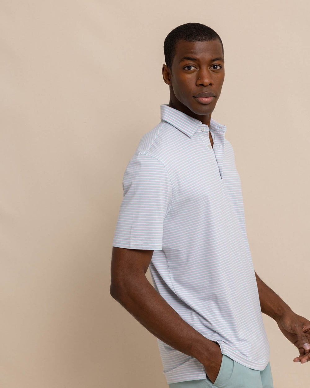 The front view of the Southern Tide Ryder Heather Halls Performance Polo by Southern Tide - Heather Wake Blue