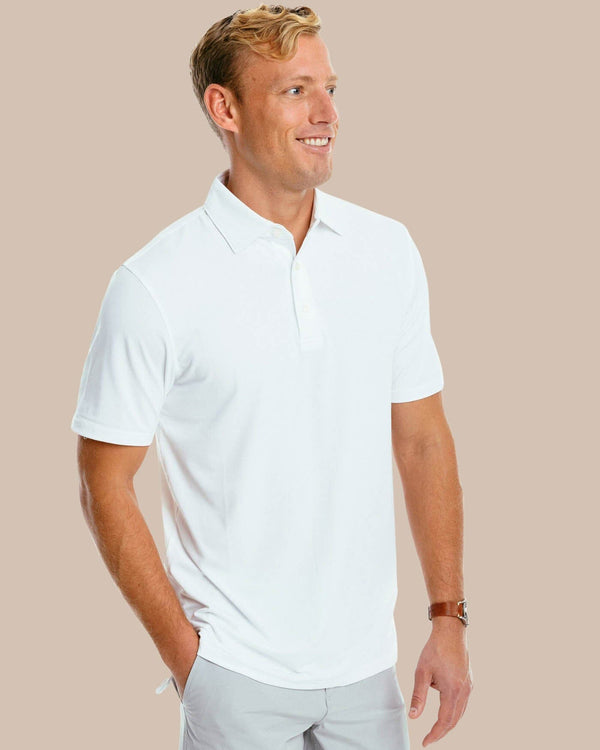 The front of the Men's Ryder Performance Polo Shirt by Southern Tide - Classic White