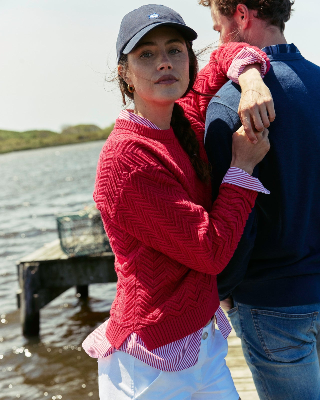 The lifestyle view of the Southern Tide Saige Sweater by Southern Tide - Grenadine Red