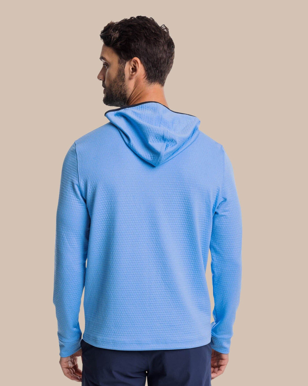 The back view of the Southern Tide Scuttle Heather Performance Quarter Zip Hoodie by Southern Tide - Heather Boat Blue