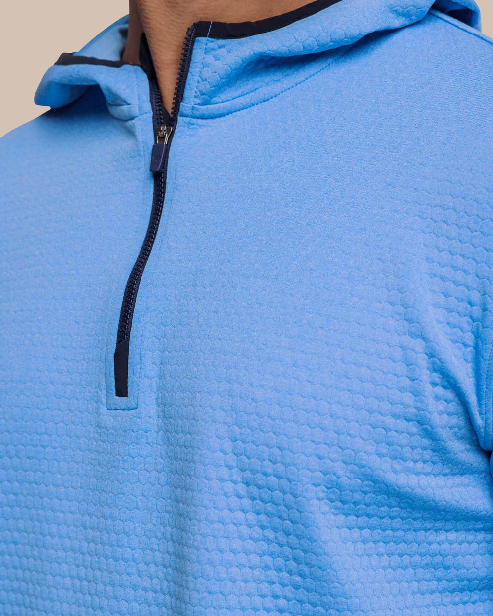 The detail view of the Southern Tide Scuttle Heather Performance Quarter Zip Hoodie by Southern Tide - Heather Boat Blue