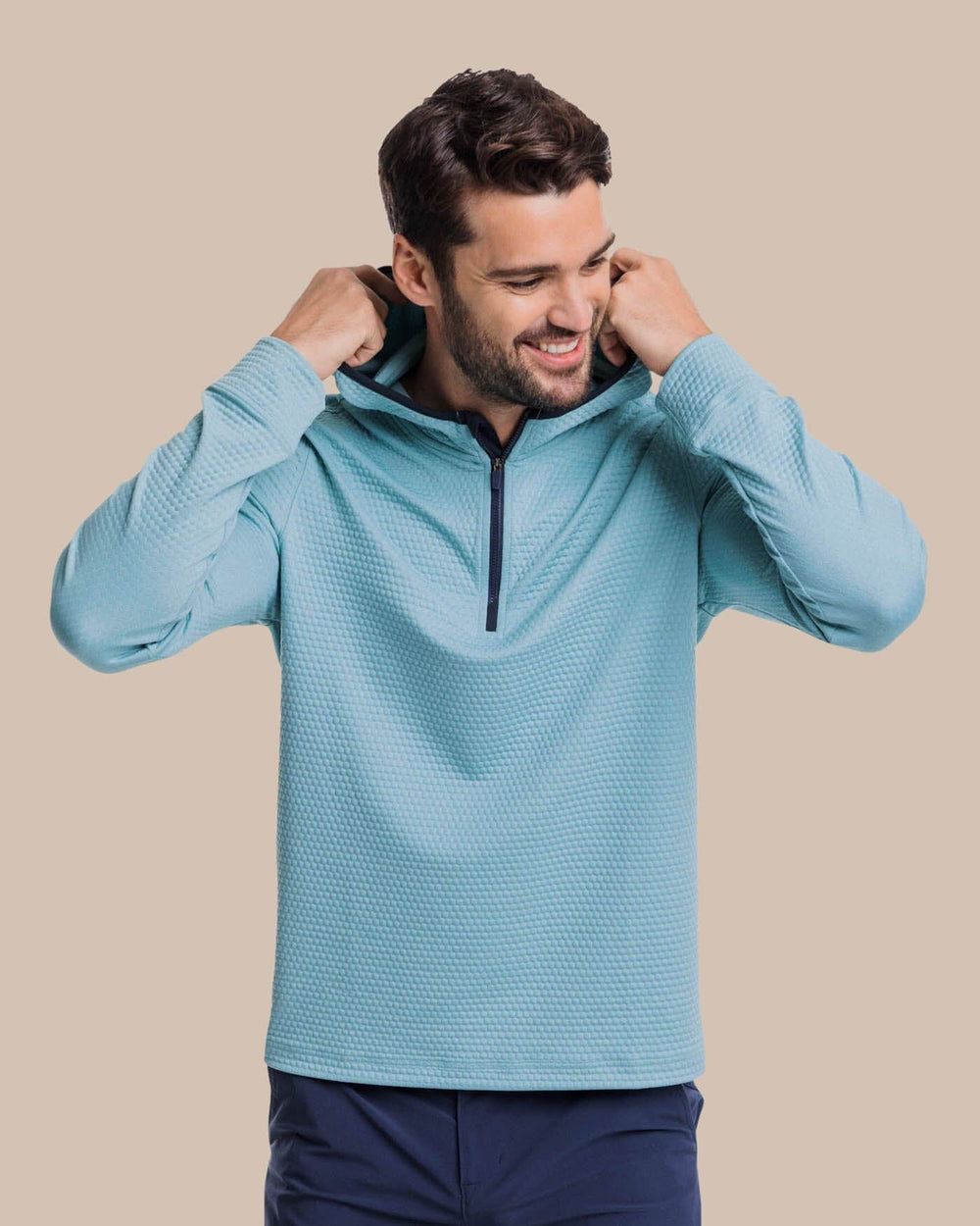 The front view of the Southern Tide Scuttle Heather Performance Quarter Zip Hoodie by Southern Tide - Heather Ocean Teal