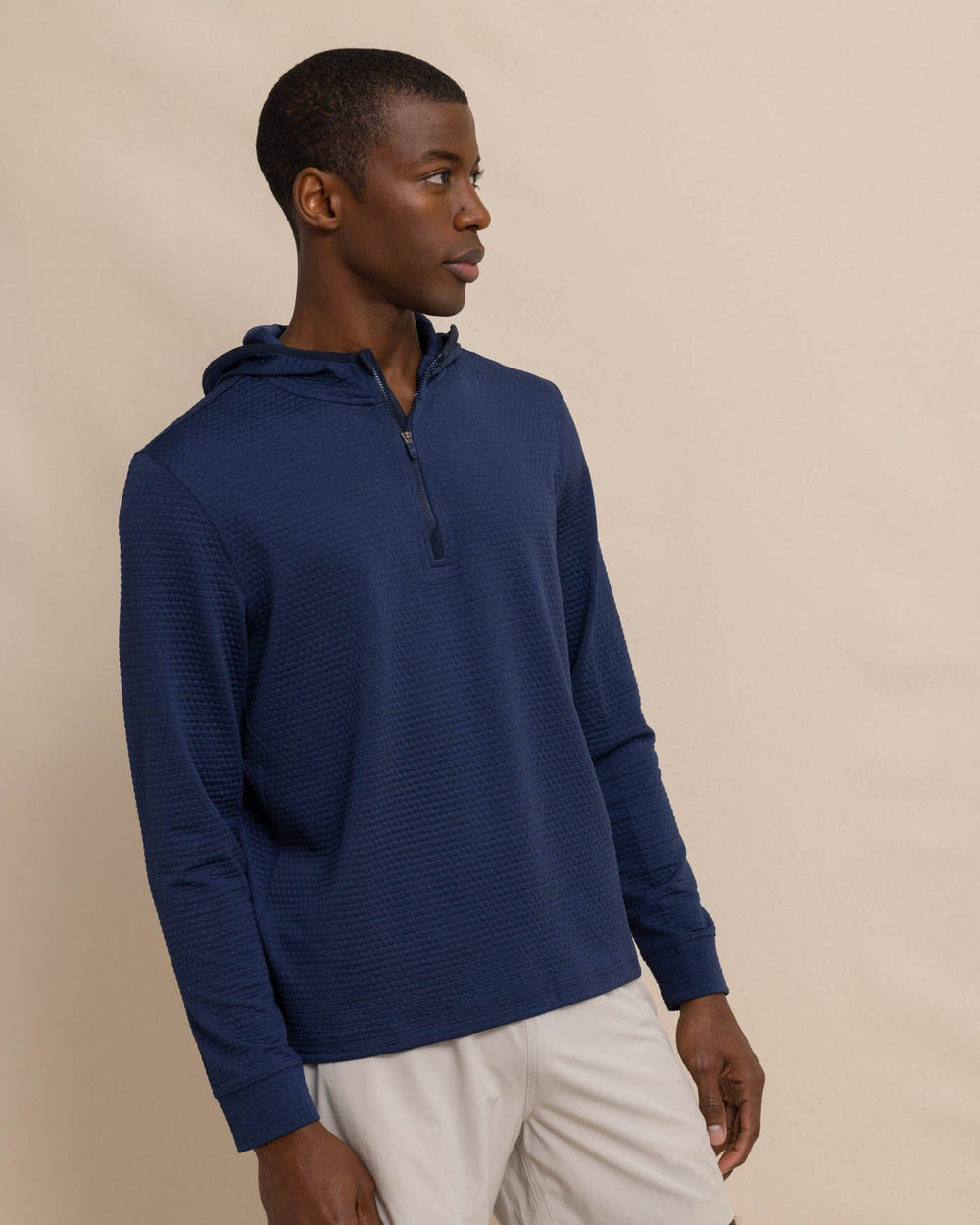 The front view of the Southern Tide Scuttle Heather Performance Quarter Zip Hoodie by Southern Tide - Heather True Navy