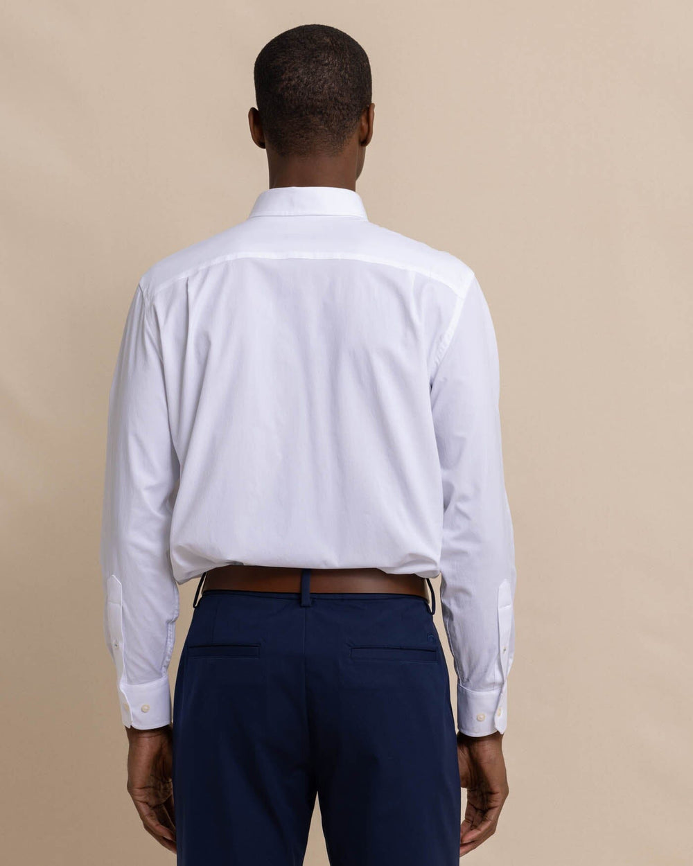 The back view of the Southern Tide Solid brrr°® Intercoastal Performance Sport Shirt by Southern Tide - Classic White