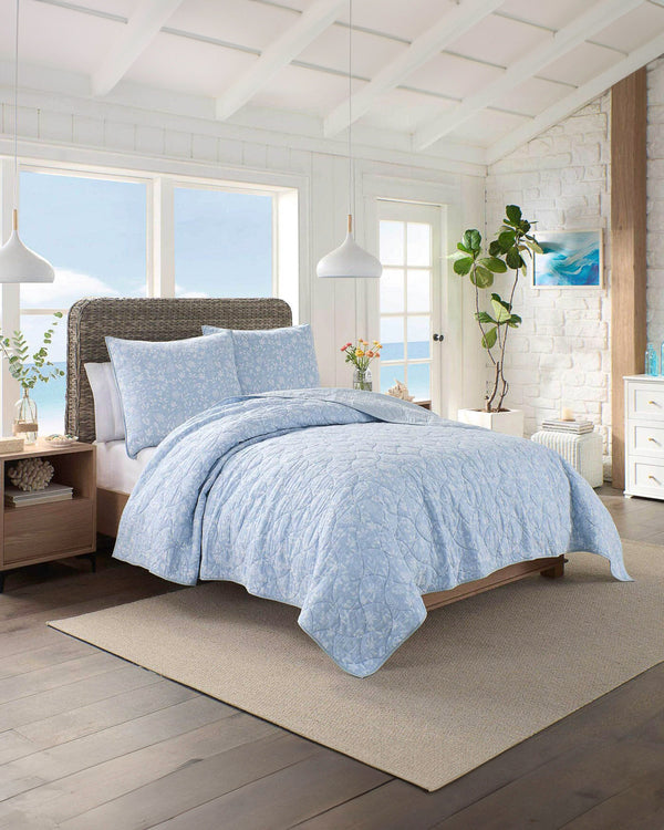 The lifestyle view of the Southern Tide Florence Blue Quilt by Southern Tide - Blue