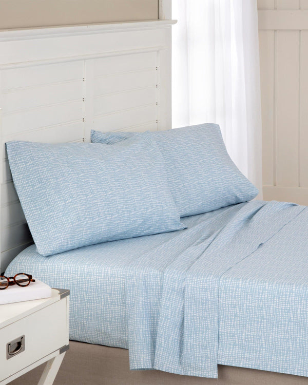 The front view of the Southern Tide Netting Plaid Sheet Set by Southern Tide - Blue