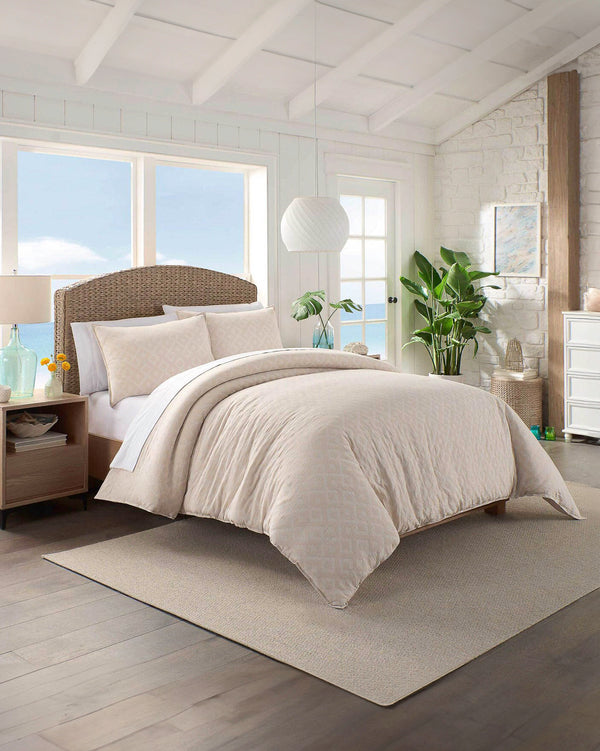 The lifestyle view of the Southern Tide Pawley's Island Tan Comforter Set by Southern Tide - Tan