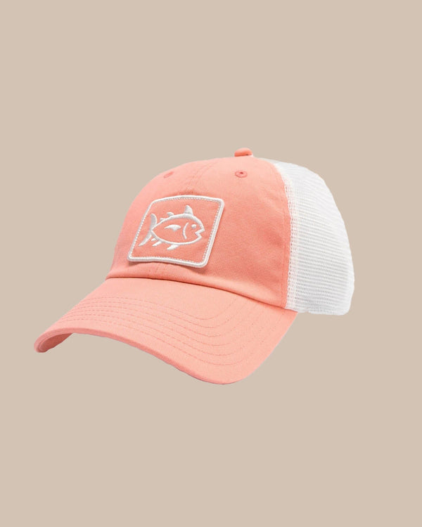The front view of the Southern Tide Sun Farer Skipjack Fly Patch Trucker Hat by Southern Tide - Apricot Blush Coral