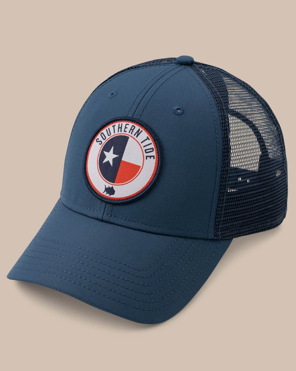 The front view of the Men's Texas Patch Performance Trucker Hat by Southern Tide - Seven Seas Blue