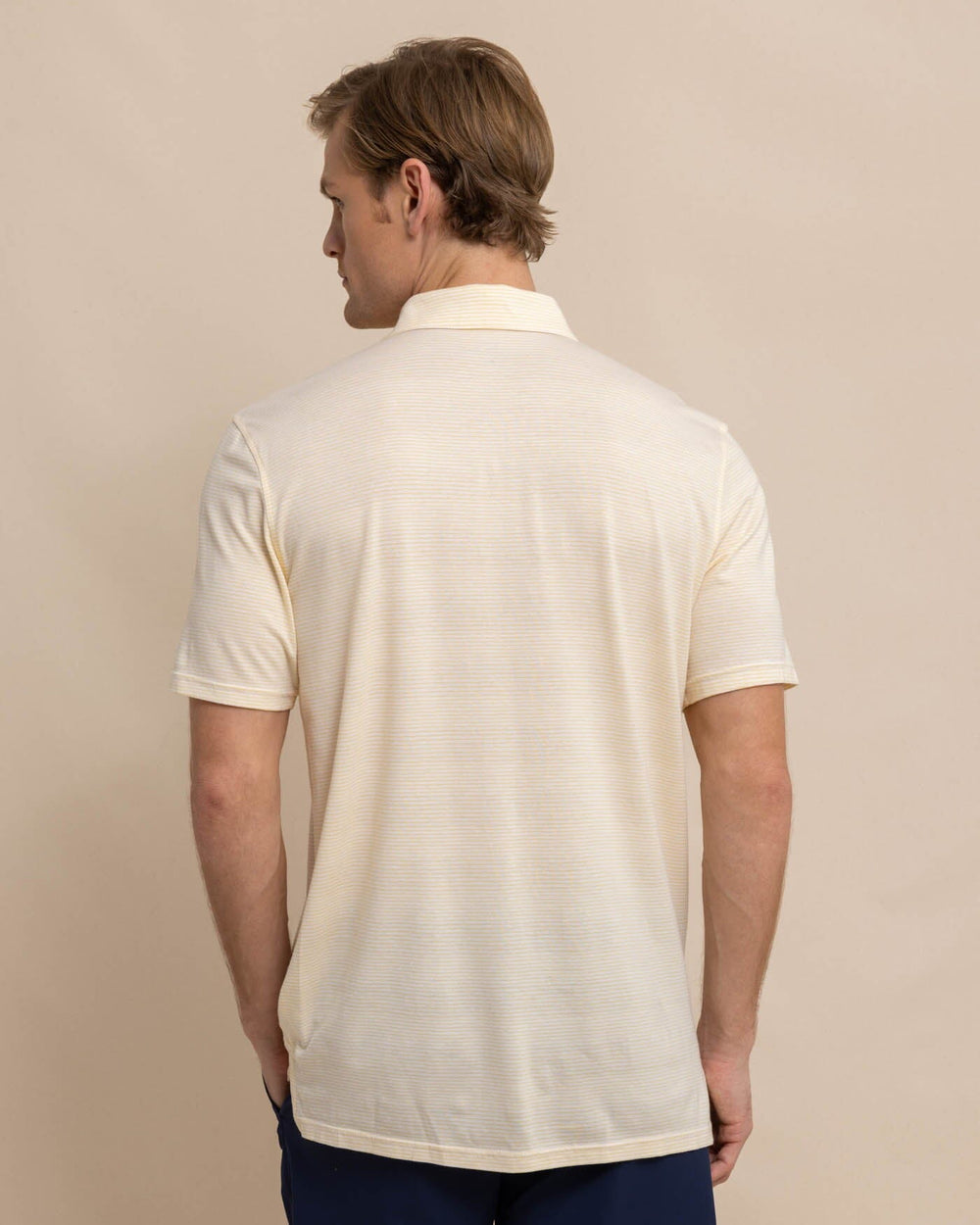 The back view of the Southern Tide The Seaport Davenport Stripe Polo by Southern Tide - Beach Ball Yellow