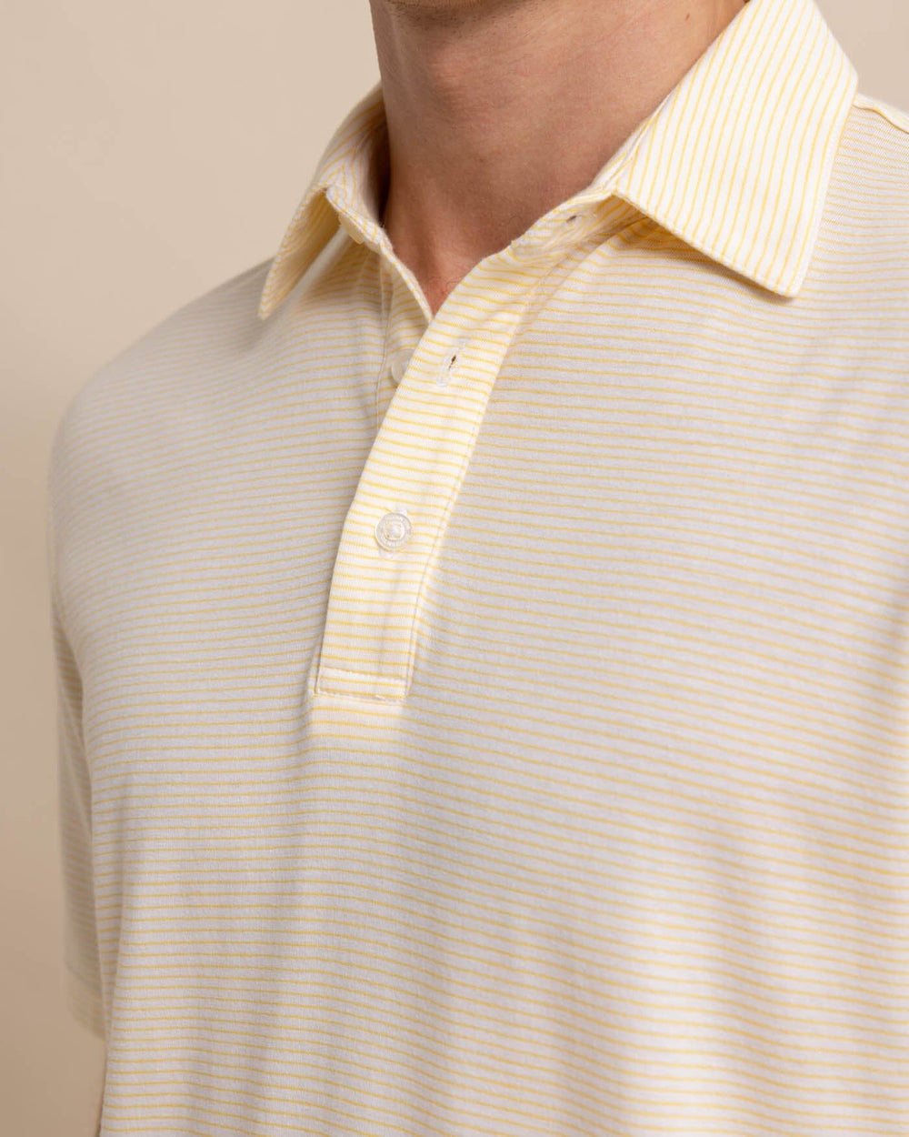 The detail view of the Southern Tide The Seaport Davenport Stripe Polo by Southern Tide - Beach Ball Yellow
