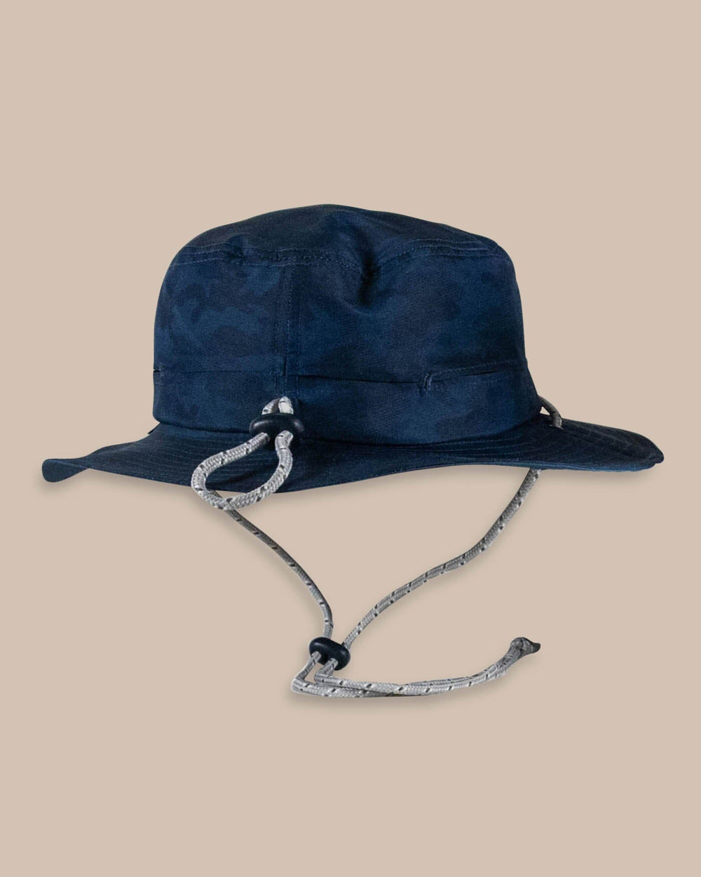 The back view of the Southern Tide Waterway Camo Print Performance Sun Hat by Southern Tide - True Navy