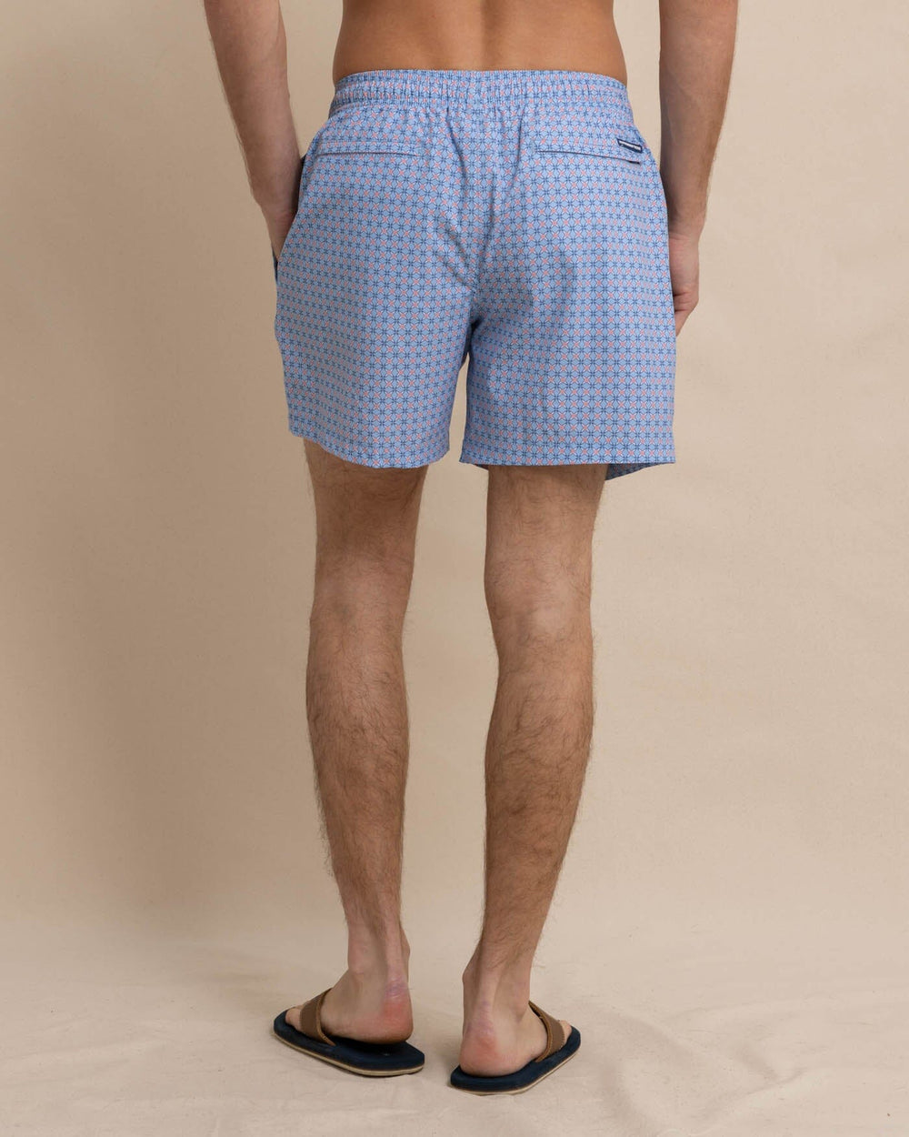 The back view of the Southern Tide White Lotus Swim Trunk by Southern Tide - Clearwater Blue