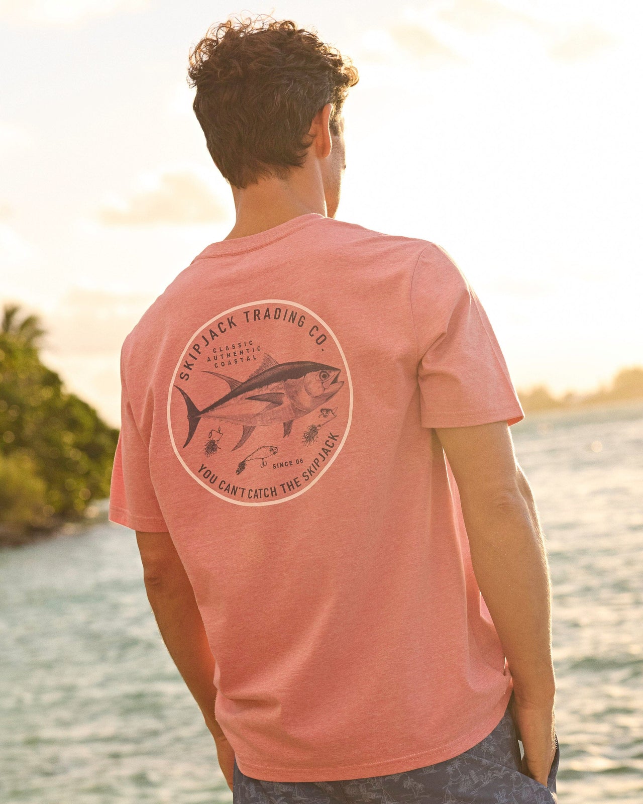 The lifestyle view of the Southern Tide You Can't Catch The Skipjack Heather Short Sleeve T-Shirt by Southern Tide - Heather Petal Pink