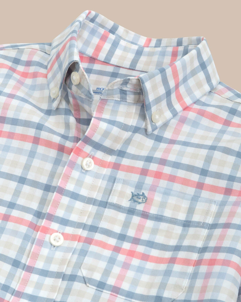 The detail view of the Southern Tide youth-coastal-passage-pelham-plaid-long-sleeve-sportshirt by Southern Tide - Geranium Pink