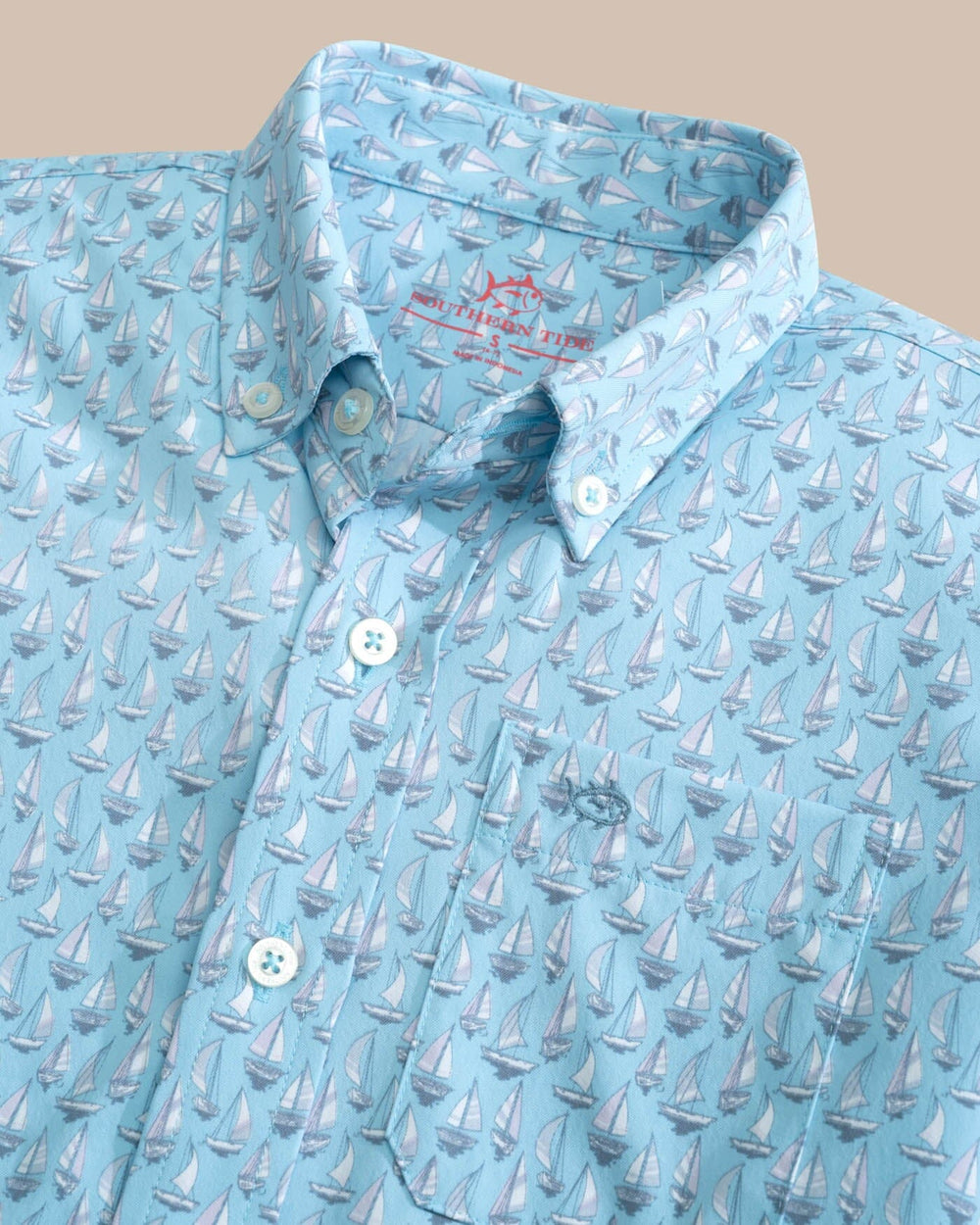 The detail view of the Southern Tide Youth Intercoastal Forget A-Boat It Short Sleeve Sport Shirt by Southern Tide - Clearwater Blue