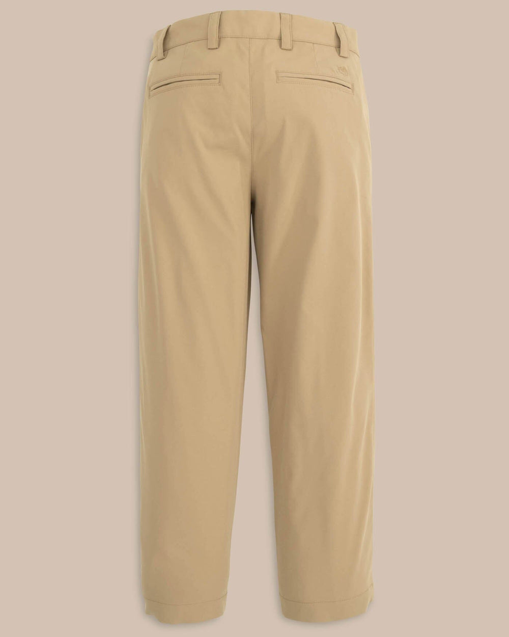 The back view of the Youth Leadhead Performance Pant by Southern Tide - Sandstone Khaki