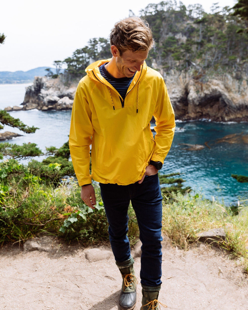 The lifestyle view of the Men's Blue Denim Charleston Denim Jeans by Southern Tide - Rinse
