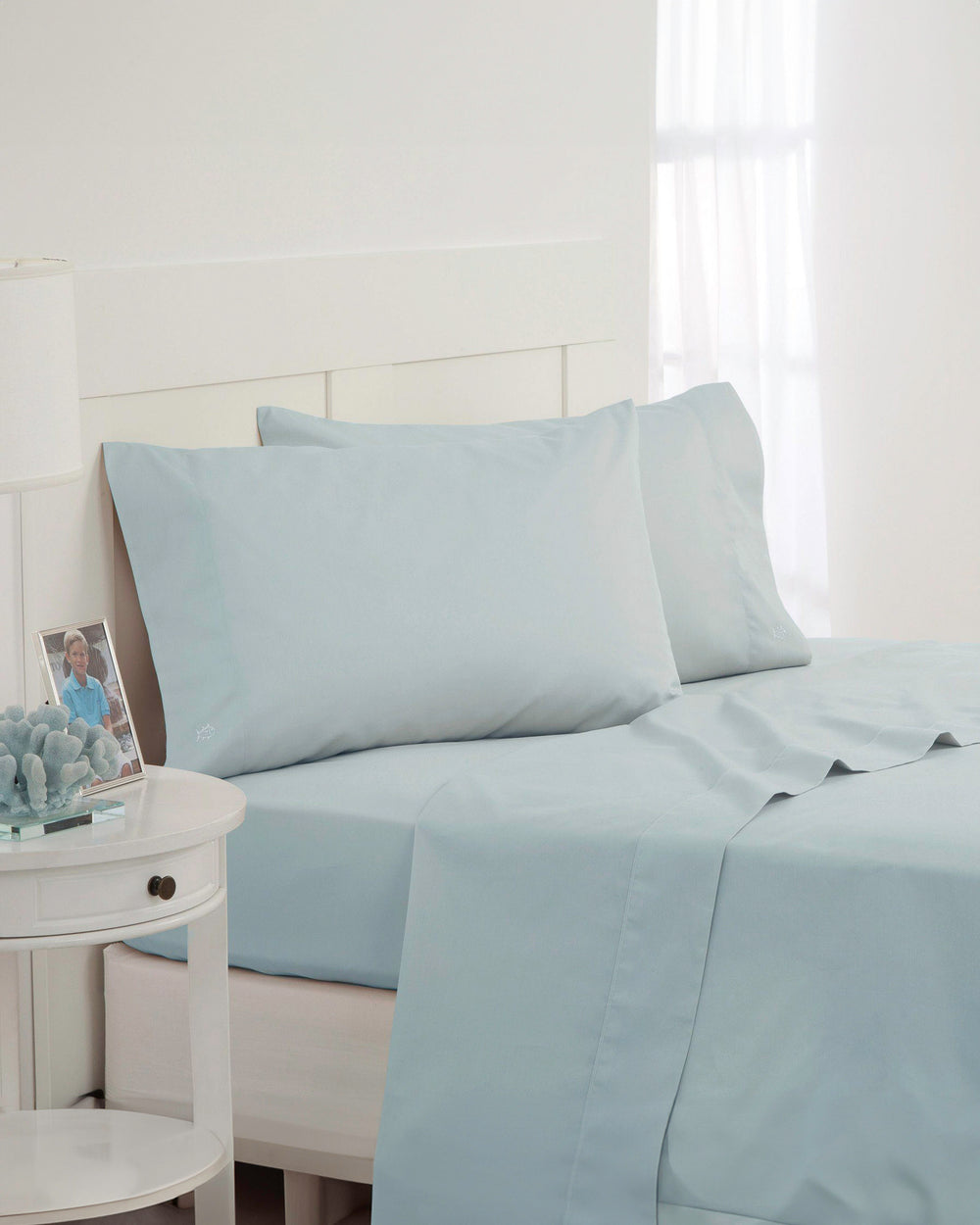 The angle front view of the Southern Tide Cotton Twill Sheet Set by Southern Tide - Sunlight Blue