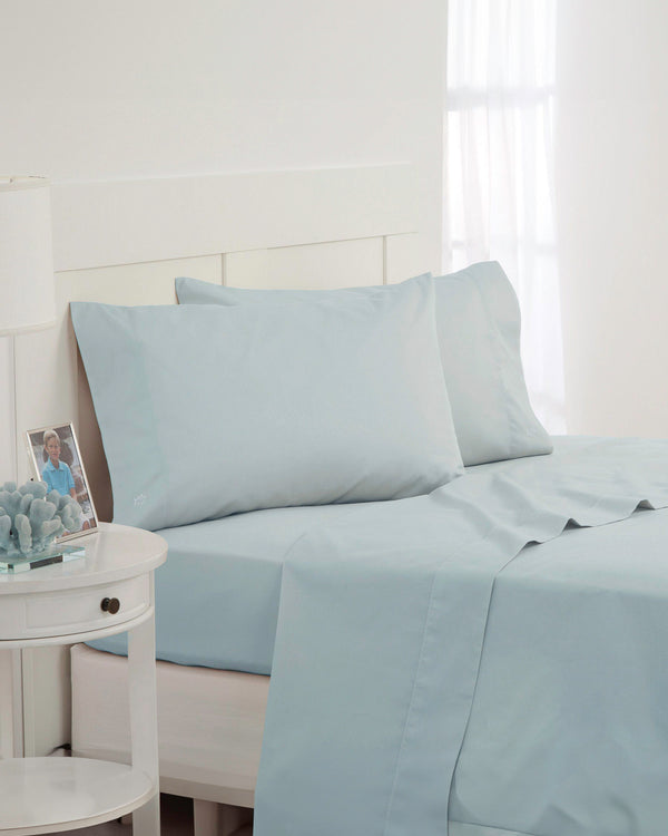 The angle front view of the Southern Tide Cotton Twill Sheet Set by Southern Tide - Sunlight Blue