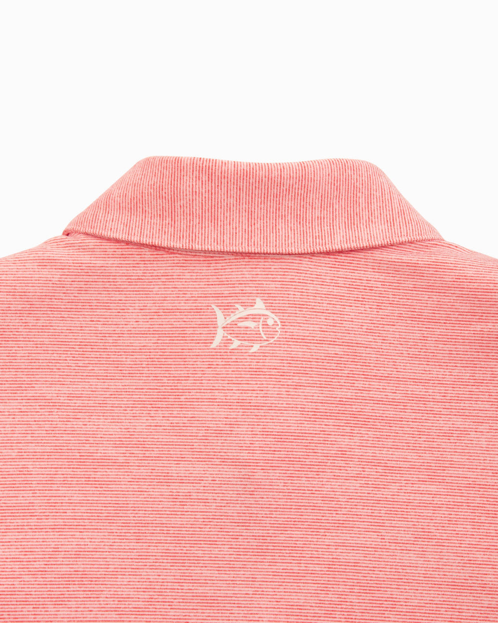 The yoke of the NC State Driver Spacedye Polo Shirt by Southern Tide - Varsity Red