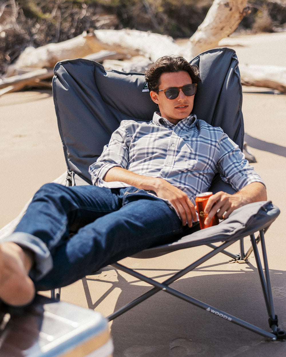 The lifestyle view of the Men's Blue Denim Charleston Denim Jeans by Southern Tide - Rinse