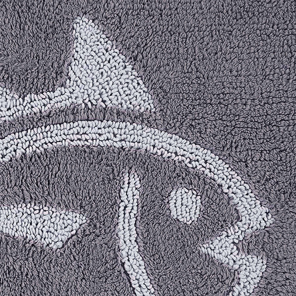 The detail view of the Reversible Skipjack Bath Rug by Southern Tide - Grey Harpoon
