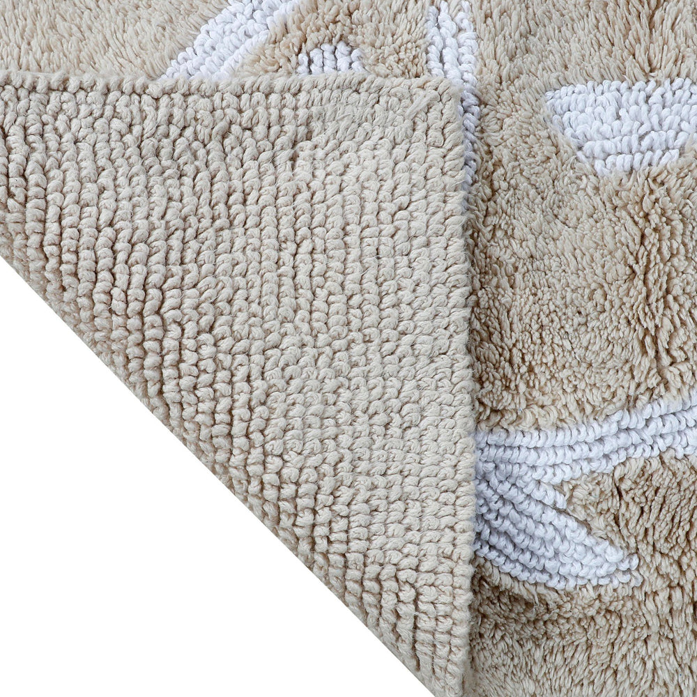 The flip view of the Reversible Skipjack Bath Rug by Southern Tide - Sand