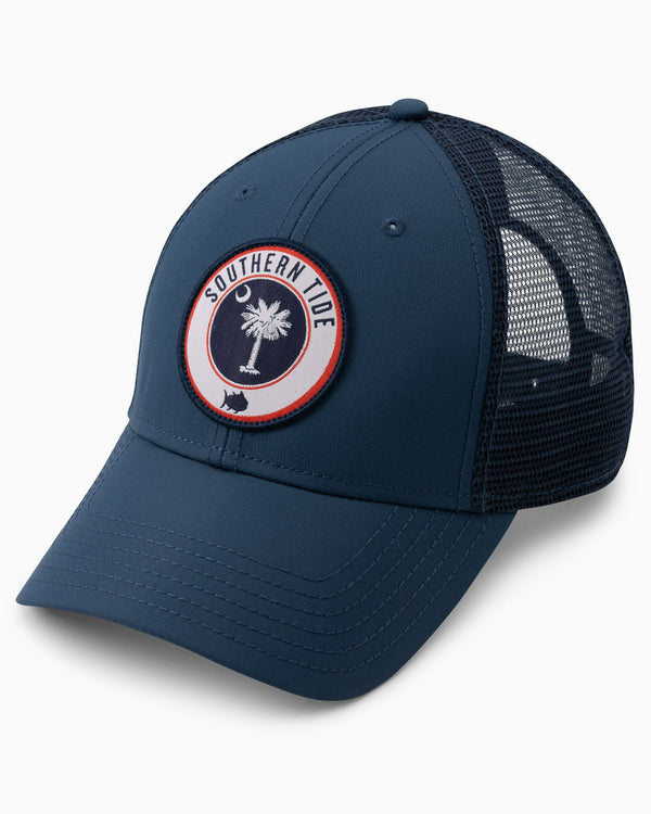 The front view of the Men's South Carolina Patch Performance Trucker Hat by Southern Tide - Seven Seas Blue
