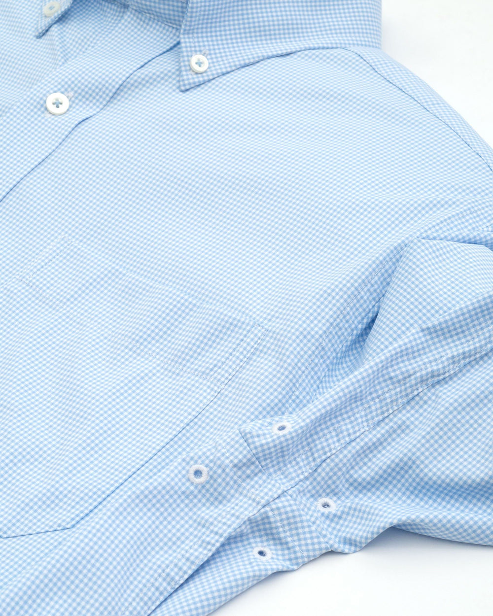 Arm vents of the Men's Light Blue UNC Tar Heels Gingham Button Down Shirt by Southern Tide - Tide Blue